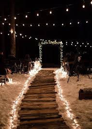 A Wintry New Years Eve Wedding Under The Stars In 2020 Outdoor Night Wedding Wedding Beach Ceremony Beach Wedding Decorations