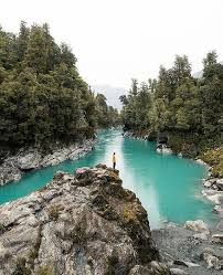the hokitika gorge has unbelievable vivid turquoise water surrounded by lush native bush that looks new zealand attractions new zealand travel nz south island