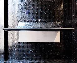 curved bathroom sink in mosaic tile