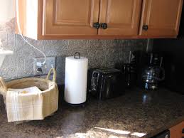 Faux metal tincopper steel wed add a faux tin pvc backsplash roll tile home it is dimensionally embossed peel and panels our faux metal tile colors patterns available in a faux stainless steel brass. 47 Punched Tin Wallpaper Backsplash On Wallpapersafari