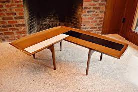 Your coffee table should be at least half the length of your sofa (but no more than roughly ⅔ the length) and should sit at about the same height as the seat, give. Mid Century Atomic Style L Shaped Boomerang Coffee Table By Dirtygirlsantiques On Etsy Coffee Tables For Sale L Shaped Coffee Table Organic Coffee Table