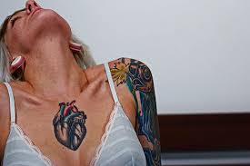 Make a literal statement by placing a heart tattoo on your chest. Heart Tattoo On Chest