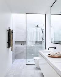 A neutral shower space with a matte black bathroom fixtures looks bold and contrasting. 13 Ways To Use Matte Black Hardware Purewow