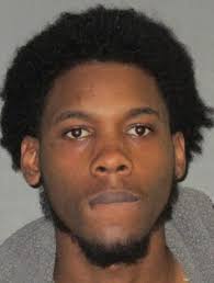 Police: Baker officer's gun passed from person to person after theft; two  men arrested