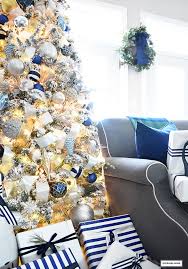 Blue and gold christmas decorations. Flocked Christmas Tree Decor Blue Silver Gold Citrineliving