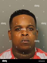 This Sunday, July 2, 2017 photo provided by the Jefferson County Sheriff  shows Ricky Hampton, also known as Finese2Tymes, who was arrested in  Alabama early Sunday, a day after a shooting at