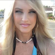 Pregnant person with a full beard