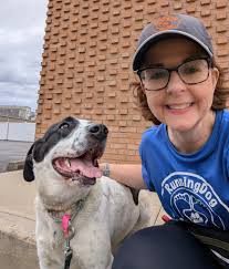 Dog orders steak at butcher shop