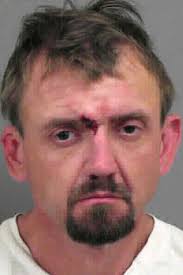 Ringgold woman wakes up to burglar; suspect flees, found hiding in nearby  woods