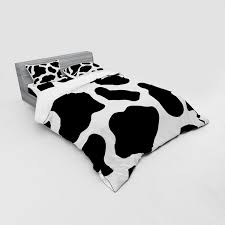 You don't have to be a cowgirl to udderly adore the striking patterns you can find in this style of animal print. East Urban Home Cow Print Duvet Cover Set Wayfair