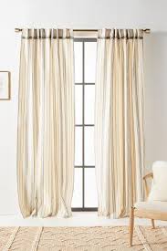 Horizontal stripes are useful for making a room seem larger when working with horizontal striped curtains, the color combination is important. Fatima Beige Navy Striped Cotton Curtains