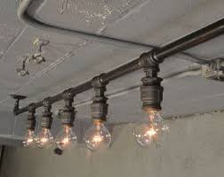 Shop indoor & outdoor lighting styles! 87 Exceptionally Inspiring Track Lighting Ideas To Pursue Homesthetics Inspiring Ideas For Your Home Industrial Track Lighting Industrial Light Fixtures Rustic Lighting