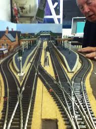 Chugging Along Online Tips For Buying Model Trains On The Internet Model Railway Track Plans Model Train Layouts Model Train Table