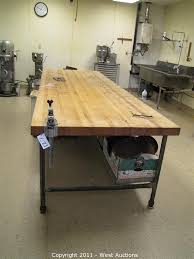 The idea for the table came only after i had gotten the wood which was given to my father by a friend as scrap wood he thought should be burnt. West Auctions Auction Commercial Baking Equipment In Auburn Ca Item Butcher Block Top Prep Table With Baking Pans And Storage Bins