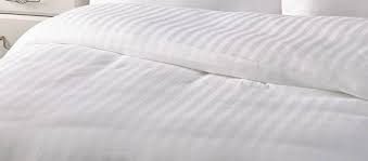 Spread the duvet cover out on your bed so that it lies flat, then lay your duvet insert out over the top of it. Hotel Duvet Cover Styles Explained Vision Linens