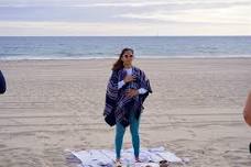 Sunday Sunsetter beach yoga on Venice beach