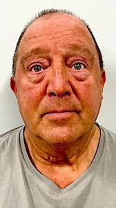 Police: Man charged after dispute over bill