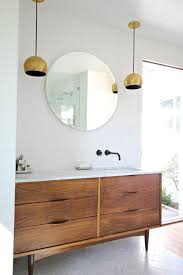 Picking a dark, moody color as the backdrop for this room was the key to the success of this makeover. 3 Vintage Furniture Makeovers For The Bathroom Diy Network Blog Made Remade Diy