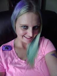 Paw print next to library in garden walk area good luck post when found