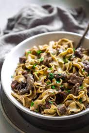 Stir water, onion, and garlic into the pan. Delicious Beef Stroganoff Recipe Ashlee Frazier