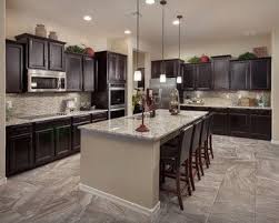 The Sabine Plan At Sky Ranch Tucson Az Brown Kitchen Cabinets Timeless Kitchen Dark Kitchen Cabinets