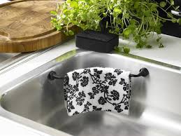 Steel sponge holder, magnetic sponge holder, kitchen soap dispenser with sponge holder, kitchen strong sponge holder: How To Avoid Kitchen Sink Clutter Core77