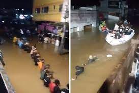 Voluntários fazem cordão humano para resgatar pessoas em Canoas (RS)