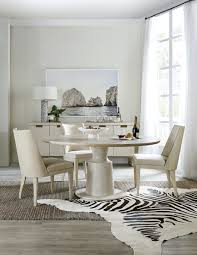 A pedestal dining table is typically recognized due to its round shape which is supported by a single wooden leg that connects to the tabletop at the middle. Hooker Furniture Dining Room Cascade Pedestal Dining Table 6120 75203 80