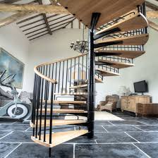 All the spaces flow into one another, and the idea of distinct rooms dissolved. China Small Space Stair Design Spiral Staircase Iron China Staircase Stainless Steel Staircase Design