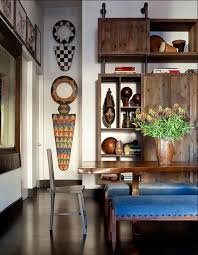 Shop wayfair for the best african american home decor. African Plank Masks And Display Objects Bring Extra Warmth And Character To This Space Get Authenti African Home Decor African Interior African Inspired Decor