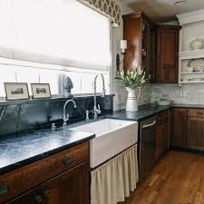 One of the cosmic black granite countertop kitchen design ideas is to make it with dark espresso color cabinets and light oak hardwood flooring. Cherry Cabinets Design Ideas