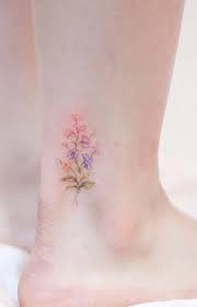 Watercolor flower sleeve tattoo might not be a good idea because when it fades away it looks totally confusing. Watercolor Flower Tattoos A Visual Guide