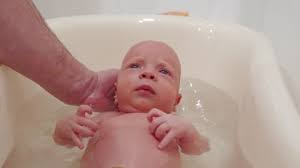Home baby baby health baby illnesses and conditions. Dad Baby Bath Stock Video Footage 4k And Hd Video Clips Shutterstock