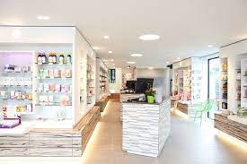 Organic Pharmacy Design Using Natural Stone Wood And Organic Materials A Light Fresh Touch To Give Salvia A Healthy Pharmacy Pharmacy Design Showroom Design