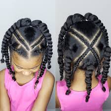 Dark curls secured in a ponytail at the back and decked up with ornate clips on. Protective Style For Girls Baby Girl Hairstyles Hair Styles Kids Hairstyles