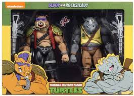 Bebop and rocksteady are likely the two most recognizable teenage mutant ninja turtles villains outside of the shredder and krang.the dimwitted duo have fought, and mostly failed, against the ninja turtles for almost three decades, starting first as toys and then in the 1987 animated series and spreading into the comics and afterwards. Check That Thing Teenage Mutant Ninja Turtles Actionfiguren Rocksteady Bebop 2 Pack Actionfiguren24 Collector S Toy Universe