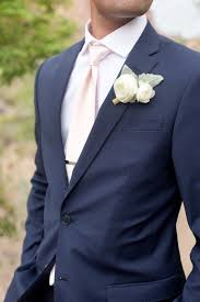 A Navy Suit And A Blush Tie For A Stylish Groom Look Navy Groom Wedding Suits Men Navy Suit Wedding