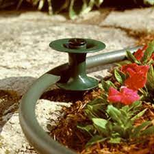 The suncast hose guide spike guides the hose away from flower beds, landscaping and shrubbery. Hose Guide Spike Starkie Bros