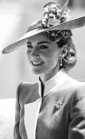 Grace Kelly wears a light pink petal gown by Oleg Cassini (1953) Photograph  by Milton H. Greene