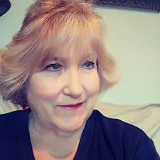 Who was the cinnamon roll vendor at the strawberry festival