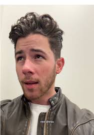 Nick Jonas Red Dress
