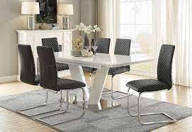 Cherry finish over cherry veneer lends a classic look to the unique design of the rectangular pedestal table base. Yannis Dining Table 5503 In White Chrome By Homelegance