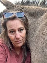 The best kind of hugs are baby donkey hugs 🥰 introducing new addition who  came in last night, Baby Midnight! photo credit: @raw6s