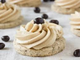 It isn't christmas without dozens and dozens of cookies coming out of the oven to take to friends, to give as gifts, and share at the table around the holidays. Coffee Cookies With Irish Cream Buttercream Frosting Devour The Blog From Cooking Channel Devour Cooking Channel