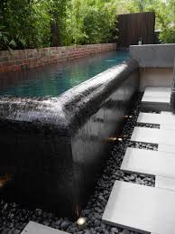 Corner Detail Of This Fantastic Infinity Edge Pool With A Black Glass Mosaic Tile Interior Finish Pinned T Swimming Pool Tiles Pool Construction Backyard Pool