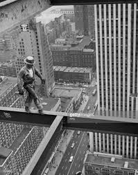 A New York Construction Worker Walks Along A Girder High Above The Photo Construction Worker Old Photos