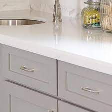 It is where good memories are born. Viatera Snow Storm Quartz Countertops Design Ideas