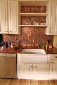 Popular at the moment are copper penny tiles…literally a penny tile backsplash made from copper coins. Copper Topped Fresh American Style