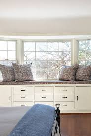 Mimicking the frame around the bed, a second wood frame lines the wall and ceiling around the window, creating a dedicated area for the custom designed desk and bench. 20 Cozy Window Seat Ideas How To Design A Window Reading Nook
