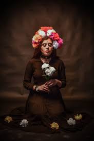 Maybe you would like to learn more about one of these? Photo Of Woman Holding Flowers Free Stock Photo